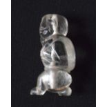 AN ANTIQUE MIDDLE EASTERN CARVED ROCK CRYSTAL TOGGLE. 5.25 cm x 2.25 cm.