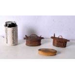 A pair of small Scandinavian carved wood lidded boxes, together with an early carved bone lidded pot