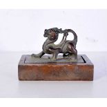 A Chinese bronze seal, formed as a mythical beast. 8.5 cm.