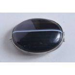 AN ANTIQUE BANDED AGATE SILVER BROOCH. 15 grams. 4 cm x 3 cm.