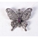 A SILVER AND AMETHYST BUTTERFLY BROOCH. 10.8 grams. 4 cm x 3.5 cm.
