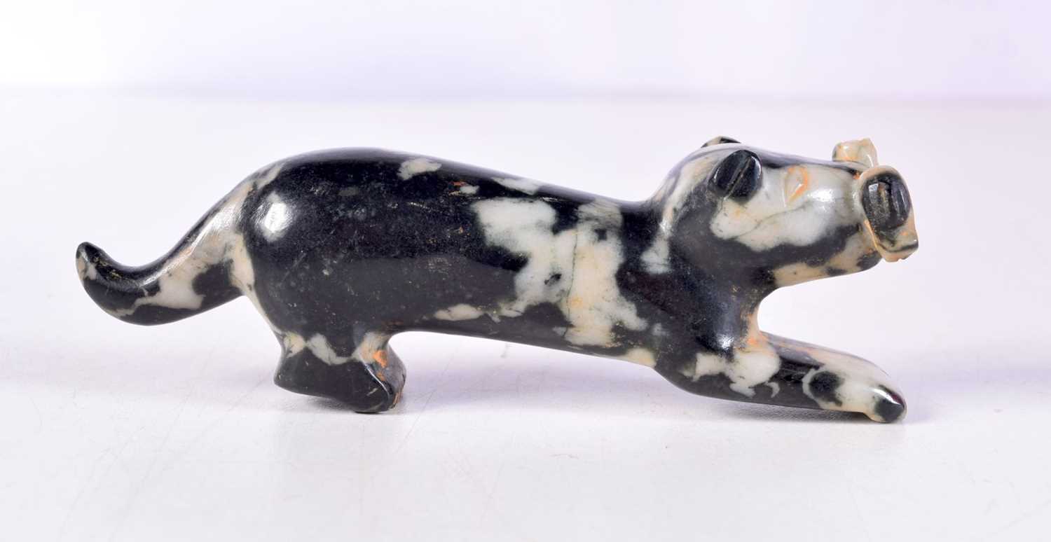 A MIDDLE EASTERN CARVED JADE BEAST. 11 cm x 3.25 cm.