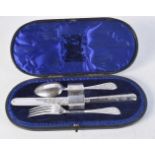 A CASED SILVER CHRISTENING SET. 108 grams. Sheffield 1909. 20 cm long.