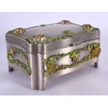 AN UNUSUAL ENAMELLED WHITE METAL JEWELLERY BOX overlaid with foliage and vines. 381 grams. 10 cm x 7