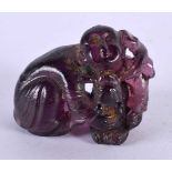 A CHINESE QING DYNASTY CARVED AMETHYST GLASS FIGURE. 6 cm x 4 cm.