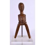 A RARE AFRICAN TRIBAL CARVED WOOD SLINGSHOT formed as a figure. 20 cm x 8 cm.