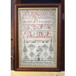 A framed Victorian sampler dated 1842. 45 x 30cm.