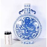 A Chinese blue and white porcelain moon flask, decorated with a dragon. 38 cm.