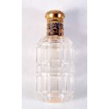 AN 18CT GOLD MOUNTED GLASS SCENT BOTTLE. 81 grams. 9.5 cm high.