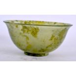 AN EARLY 20TH CENTURY CHINESE CARVED GREEN MOSS AGATE TEABOWL Late Qing/Republic. 10 cm diameter.