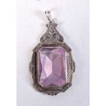 A SILVER AND AMETHYST PENDANT. 13.3 grams. 5.5 cm x 3 cm.