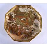 A LATE 19TH CENTURY JAPANESE MEIJI PERIOD SATSUMA DISH painted with figures in landscapes. 22 cm