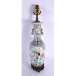 A 19TH CENTURY CHINESE FAMILLE ROSE STRAITS PORCELAIN LAMP Qing. 44 cm high.