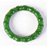 A CHINESE JADE BANGLE. 5.5 cm wide.