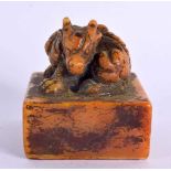 A CHINESE CARVED ORANGE SOAPSTONE SEAL 20th Century. 5.5 cm square.