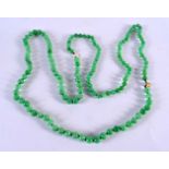 A CHINESE 14CT GOLD AND JADEITE NECKLACE. 168 grams. 62 cm long.