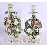 A PAIR OF 18TH CENTURY ENGLISH PORCELAIN CANDLESTICKS probably Bow or Derby, formed with parrots