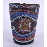 A 19TH CENTURY MIDDLE EASTERN GARBI GLASS CYLINDRICAL GOBLET After the Antiquity, inset with mask