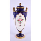 A SMALL MINTONS PORCELAIN VASE AND COVER painted with flowers. 15 cm high.