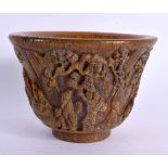 A CHINESE CARVED BUFFALO HORN TYPE LIBATION CUP 20th Century. 414 grams. 11 cm diameter.