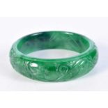 A CHINESE JADE BANGLE. 49.6 grams. 5 cm diameter.