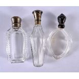 THREE ANTIQUE SILVER TOPPED SCENT BOTTLES. 229 grams. 11 cm x 3.25 cm. (3)
