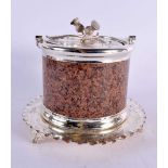 A LOVELY ANTIQUE SCOTTISH SILVER PLATED GRANITE BISCUIT BARREL AND COVER mounted with thistles. 1958