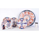 A collection of Japanese Imari porcelain. Largest 40 x 40cm (5).