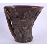 A CHINESE CARVED BUFFALO HORN TYPE LIBATION CUP 20th Century. 908 grams. 14 cm x 16 cm.