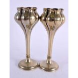 A PAIR OF ART NOUVEAU EPNS SILVER PLATED VASES of organic form. 300 grams. 19 cm high.