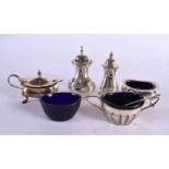 A HARLEQUIN SILVER CRUET SET. Birmingham 1898 to 1952. Silver 209 grams. Largest 8.25 cm x 4.5