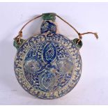 A 19TH CENTURY MIDDLE EASTERN POTTERY FLASK painted with blue motifs. 18 cm x 12 cm.