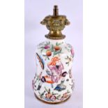 A 19TH CENTURY FRENCH PORCELAIN COUNTRY HOUSE LAMP after the Canton famille rose original. 28 cm