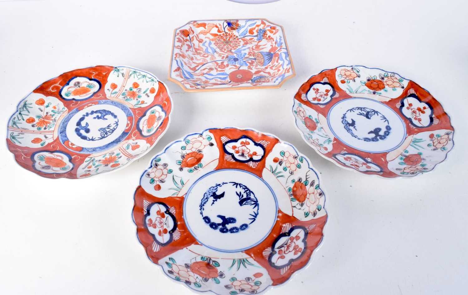 A collection of Japanese Imari porcelain plates together with another dish. Largest 21cm (5).