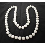 A CHINESE WHITE JADE NECKLACE. 96 grams. 92 cm long.