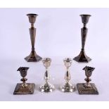 THREE PAIRS OF SILVER CANDLESTICKS. London 1887, Chester 1911 & Birmingham 1970. 1740 grams overall.