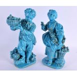 A PAIR OF 19TH BLUE GLAZED PORCELAIN FIGURES OF A BOY AND GIRL Minton or Sevres, painted with gilt