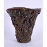 A CHINESE CARVED BUFFALO HORN TYPE LIBATION CUP 20th Century. 854 grams. 14 cm x 14 cm.