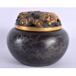 A CHINESE SILVER INLAID BRONZE CENSER AND COVER 20th Century. 13 cm diameter.