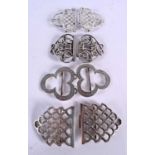 FOUR ANTIQUE SILVER BELT BUCKLES. Chester 1898, London 1899 & 1901, Birmingham 1900. 175 grams.