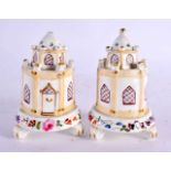 AN UNUSUAL PAIR OF EARLY 19TH CENTURY ENGLISH PORCELAIN POT POURRI AND COVERS formed as houses,