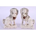 A PAIR OF 19TH CENTURY STAFFORDSHIRE PORCELAIN FIGURES modelled holding baskets. 9 cm x 5 cm.