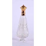AN 18CT GOLD MOUNTED GLASS SCENT BOTTLE. 49 grams. 11 cm x 3.75 cm.