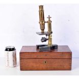A boxed antique microscope. 23cm high.