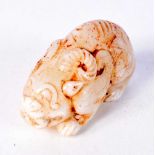 A CHINESE WHITE JADE CARVING OF A MYTHICAL BEAST. 4cm x 7.3cm x 3.4cm