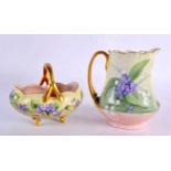 A FRENCH LIMOGES ENAMEL PORCELAIN BASKET together with a similar jug. Largest 15 cm x 10 cm. (2)