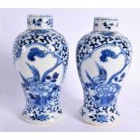 A PAIR OF 19TH CENTURY CHINESE BLUE AND WHITE PORCELAIN VASES bearing Kangxi marks to base. 14 cm