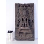 A carved wood tribal panel. 42 x 22cm.