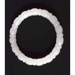 A CHINESE JADE BANGLE. 4.5 cm wide.