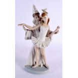 A LLADRO FIGURE OF A BOY AND GIRL. 27 cm high.